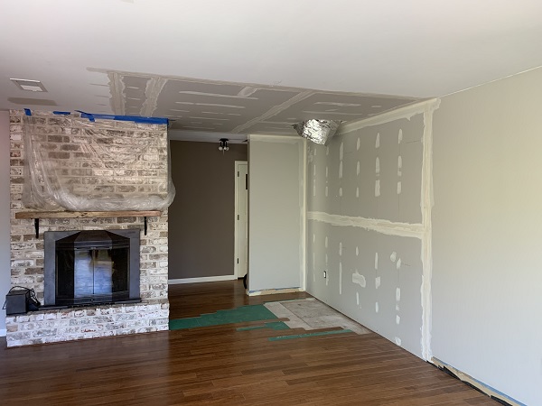 Drywall hole before repair